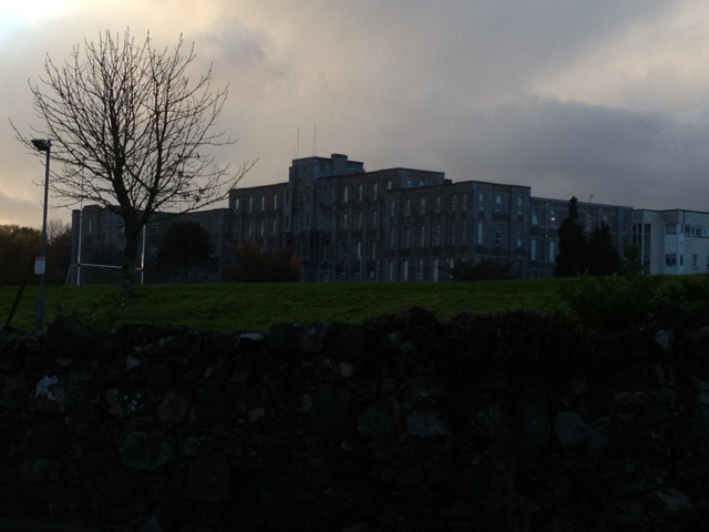 This gloomy edifice is my kid's school. The sky is representative. 