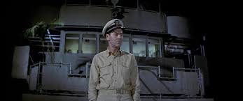 The bridge on the "Brown" is not nearly as luxurious as the one we see beyong Mr. Roberts (Henry Fonda) on this navy cargo ship