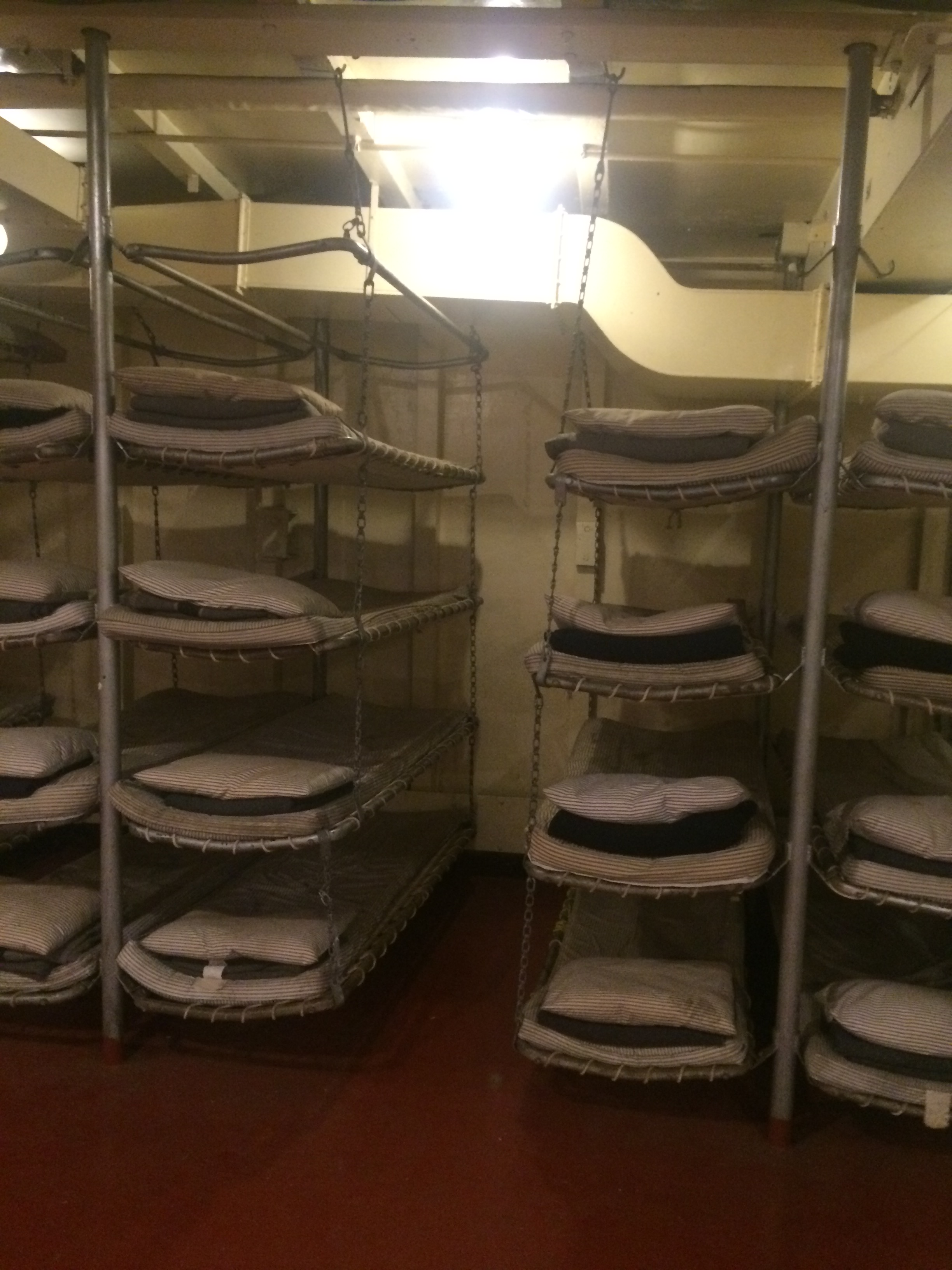 Troop bunks, stacked five high. 